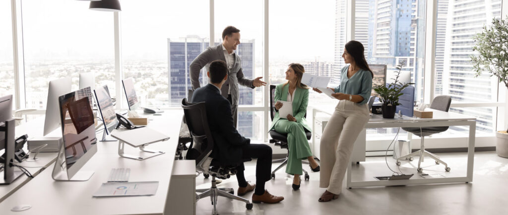 four colleagues actively engaged